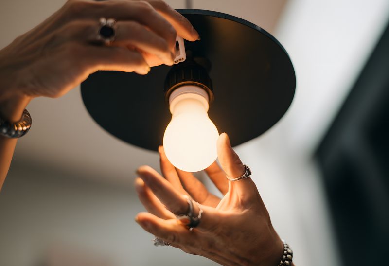 Handyman Installing Fixture